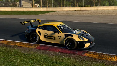 The EDR Broadcast Porsche 911 Cup car, number 12 in yellow and black, riding the kerb at Road America in iRacing.